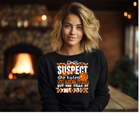 Suspect claims she hates bad sportsmanship but yells at the ref